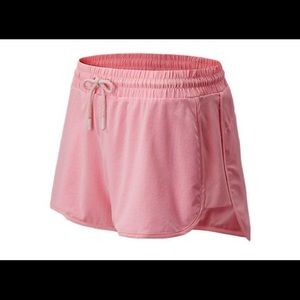 Pink New Balance for J. Crew athletic shorts